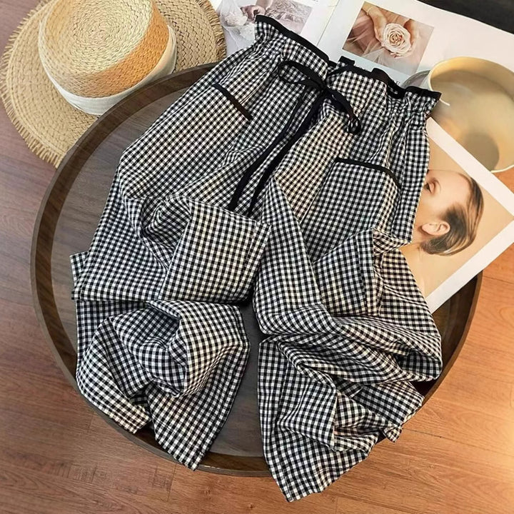 Women's wide Vichy pants with high smocked waist, drawstring, and patch pockets