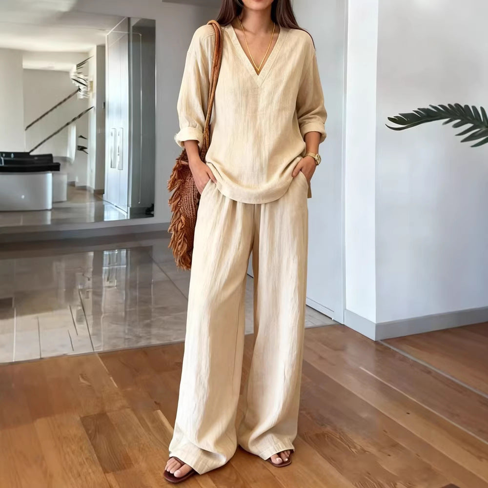 Women's lightweight linen look two-piece set with deep V-neck, loose 3/4 sleeves, and wide palazzo pants cut Mune Fashion