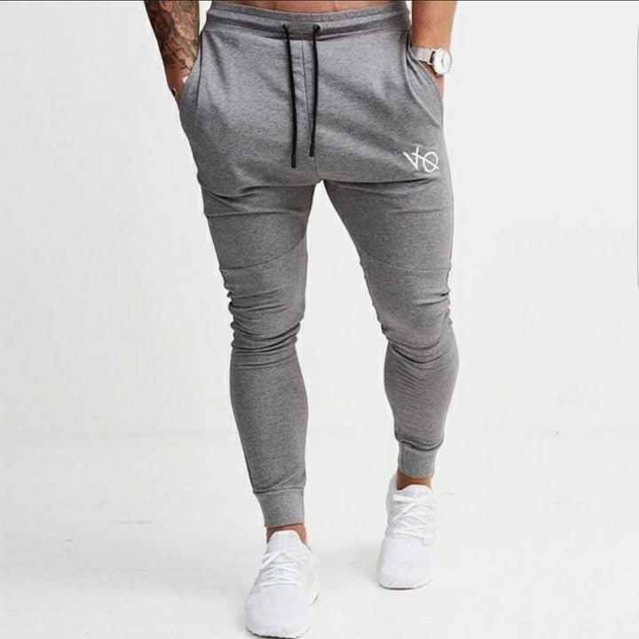 Men's narrow cut jogging pants with elastic waistband and drawstring Mune Fashion