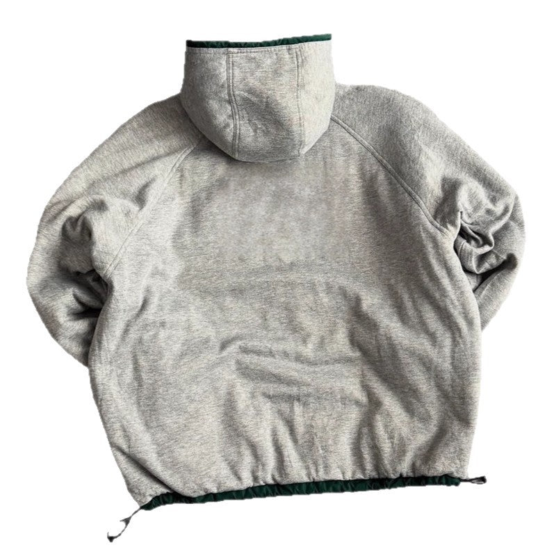Unisex non-fitted windbreaker with hood padded fleece lining drawstring hem and decorative stripes on sleeves Mune Fashion