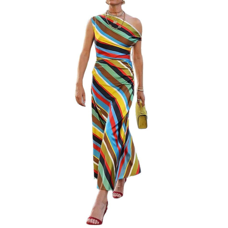 Women's asymmetrical off-shoulder maxi dress with diagonal stripe pattern and fitted silhouette Mune Fashion