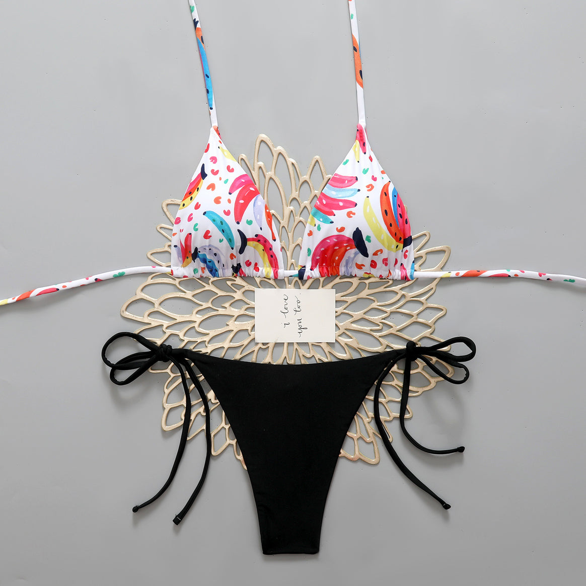 Women’s bikini set with colorful designs and adjustable side straps Mune Fashion
