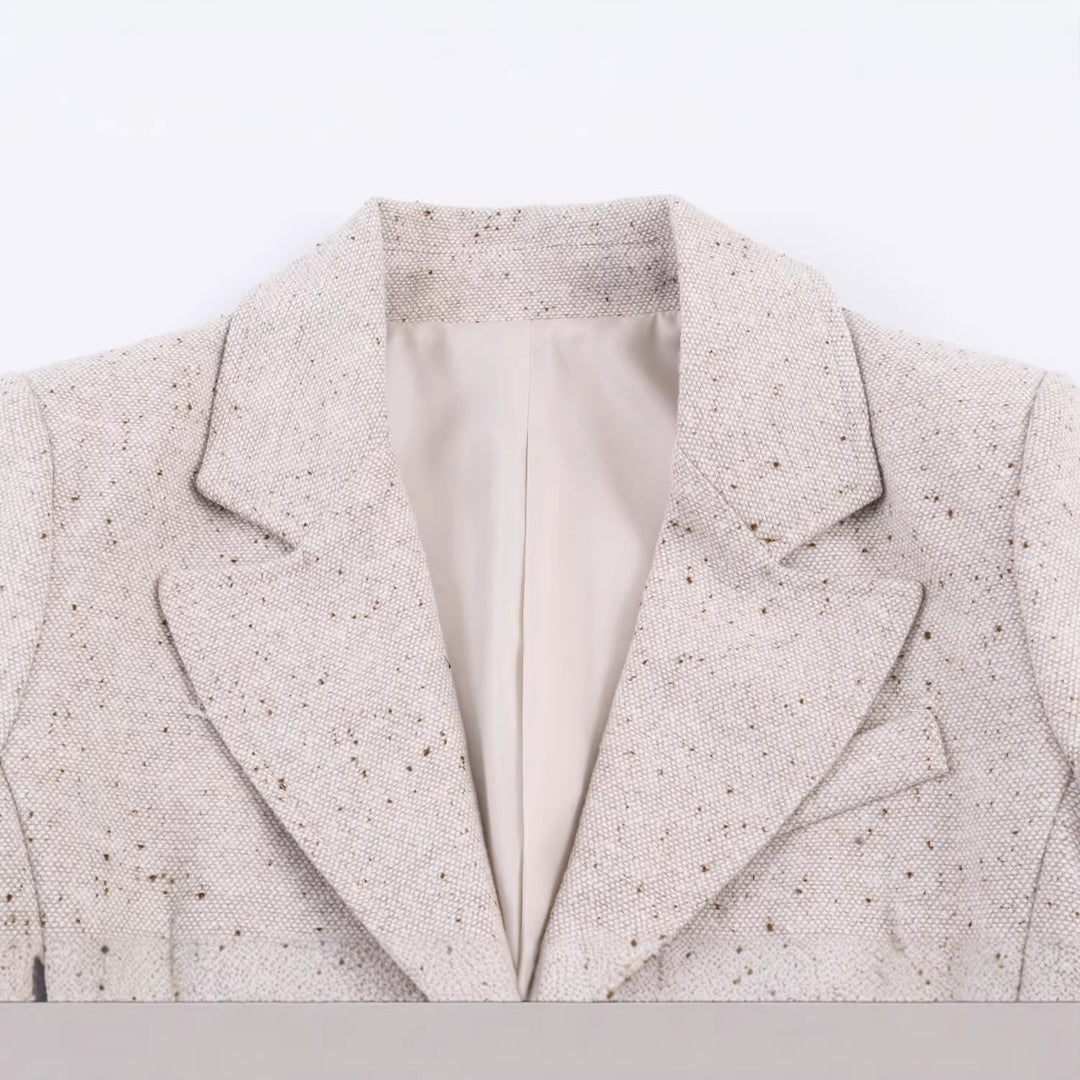 Women's structured tweed blazer with shaping seams, flap pockets, and covered buttons Mune Fashion
