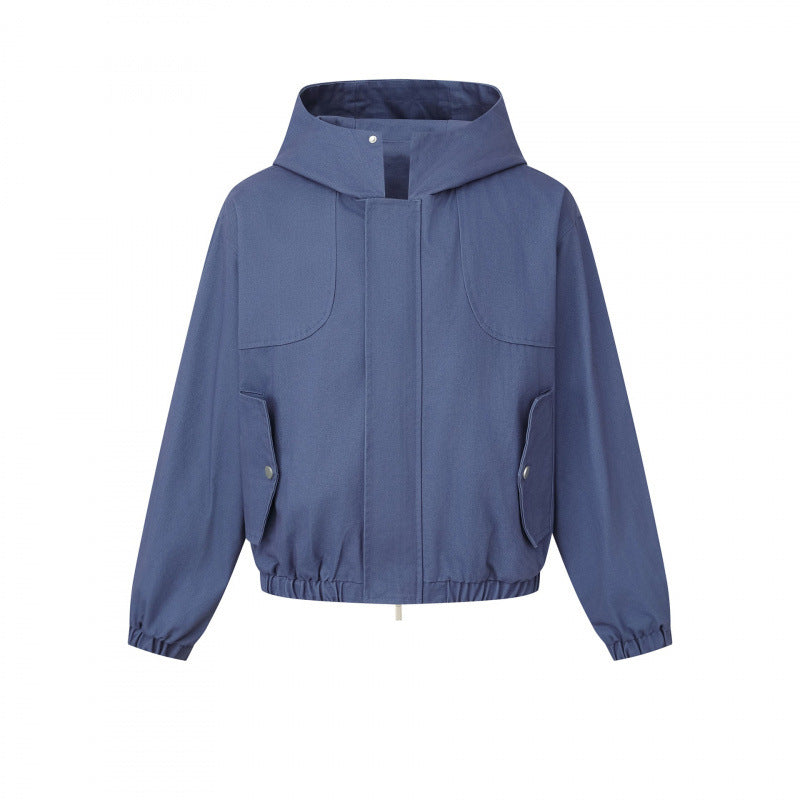 Ladies short cut hooded blouson jacket with textured fabric, patch pockets, and elastic hem Mune Fashion