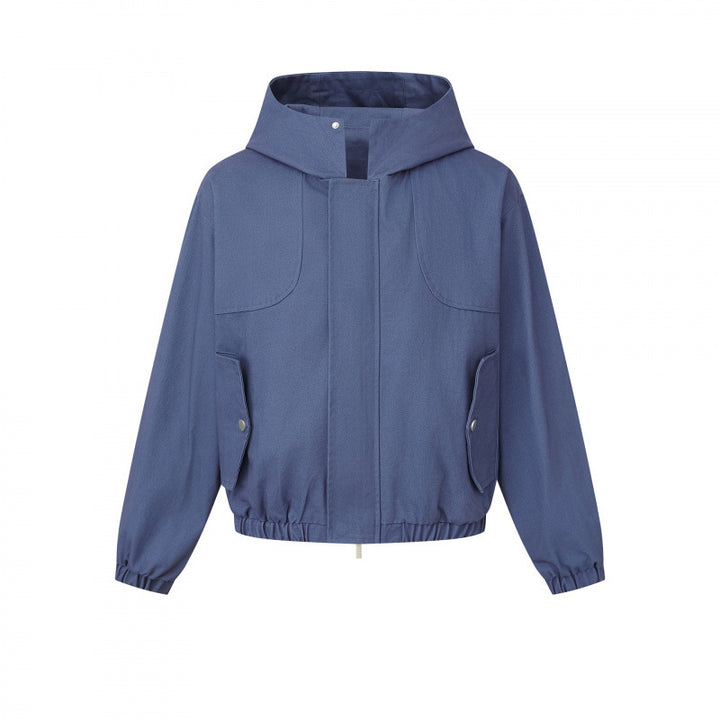 Ladies short cut hooded blouson jacket with textured fabric, patch pockets, and elastic hem Mune Fashion