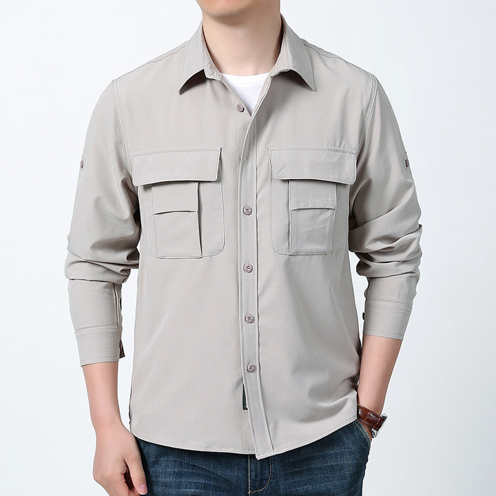Men's lightweight field shirt with concealed button placket, two patch breast pockets and roll-up sleeves.
