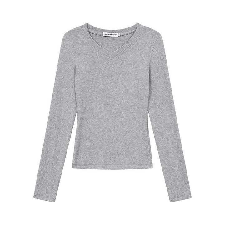 Women's long sleeve shirt with V-neck and fitted slim-fit style