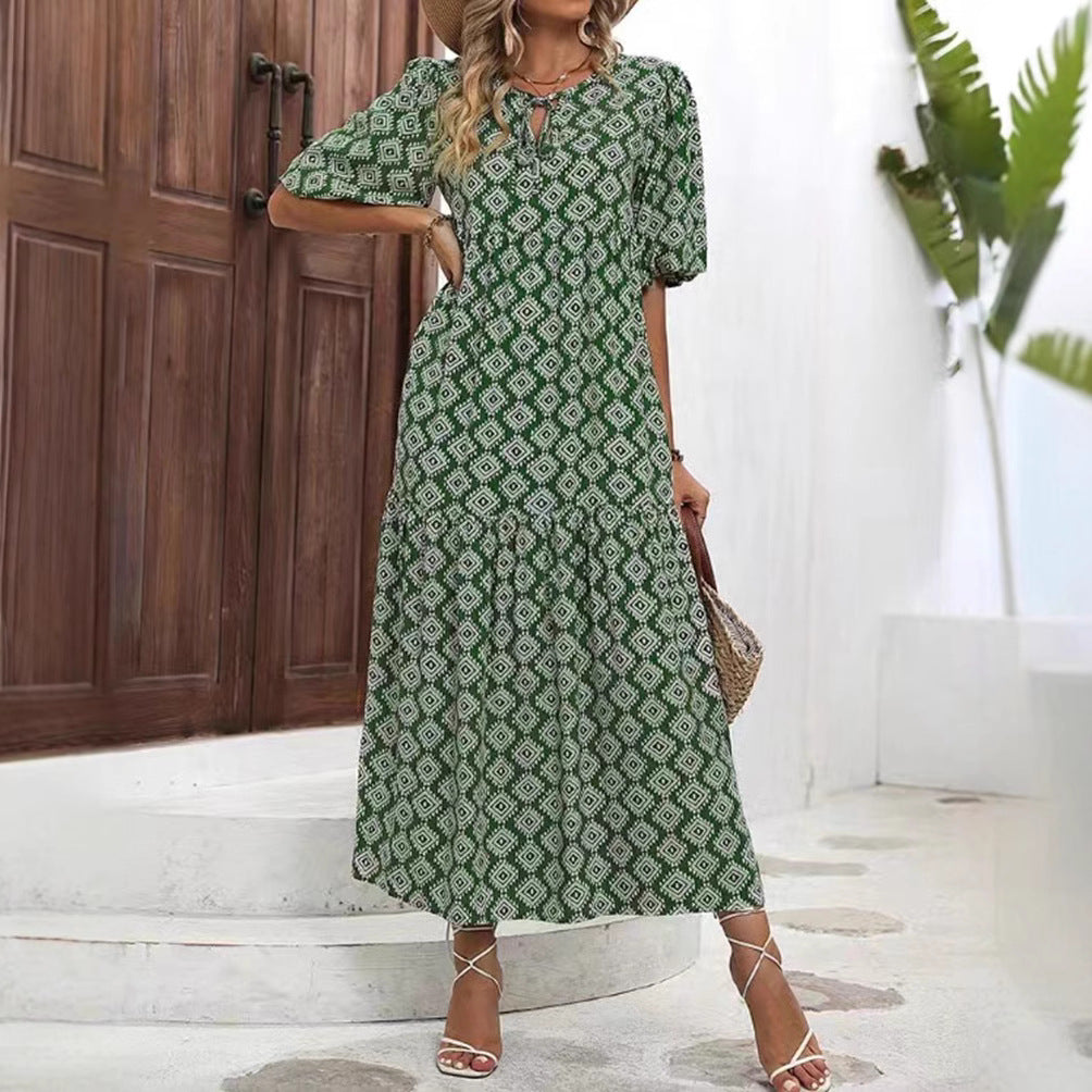 Women’s airy maxi dress with geometric ethnic print, gathered tiered skirt and keyhole neckline Mune Fashion