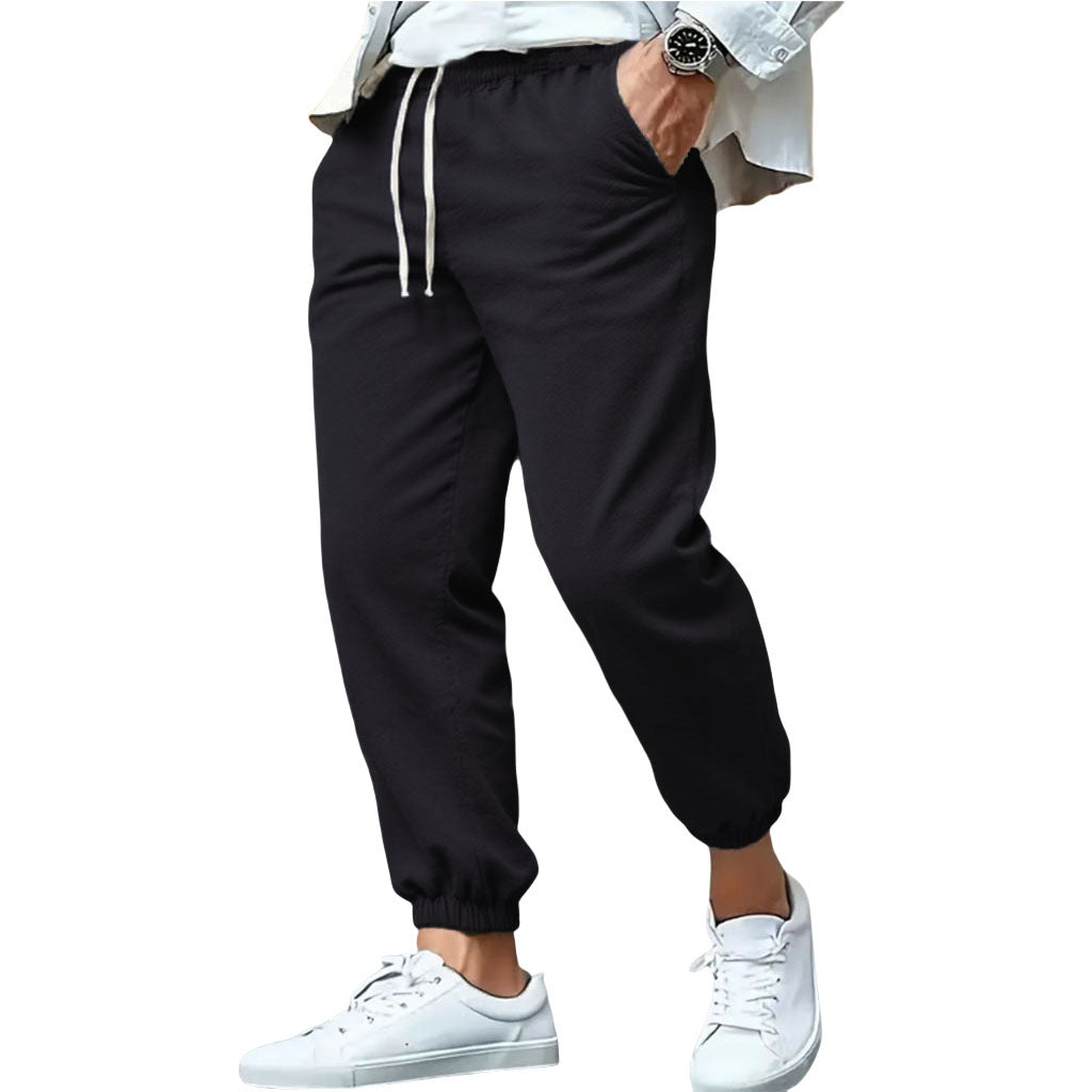 Men's nan tapered sweat joggers with elastic waistband, drawstring, and cuffed hems Mune Fashion