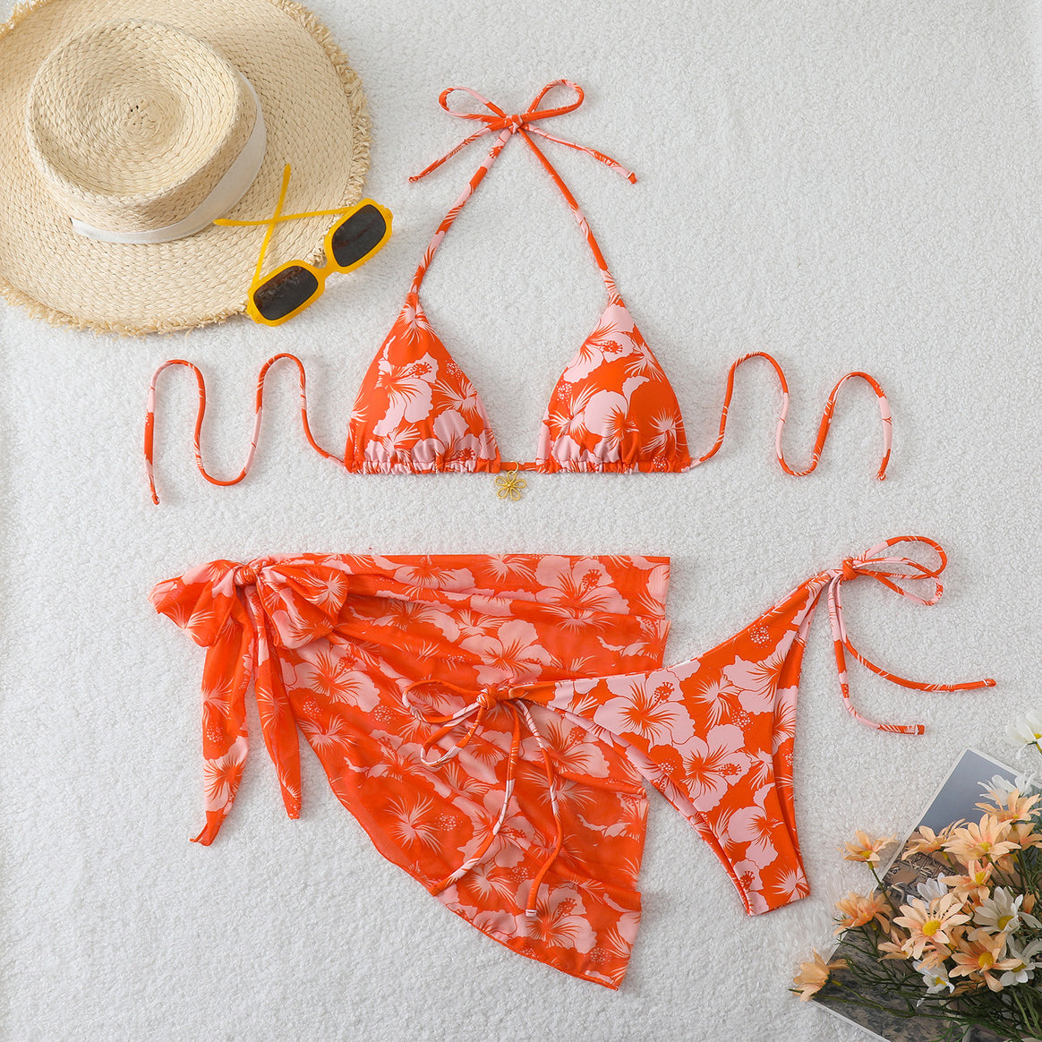 Women's bikini set with floral design and stylish wrap skirt Mune Fashion