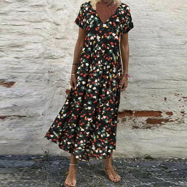 Women’s V-neck maxi dress with fine pleated skirt, empire bodice and short sleeves Mune Fashion