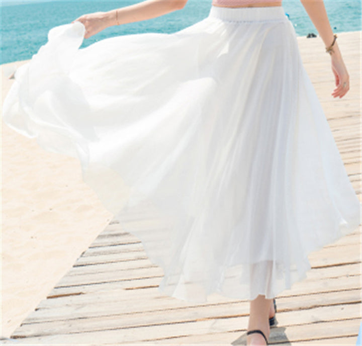 Women's flowing maxi skirt made of chiffon with elastic waistband and layered ruffle Mune Fashion