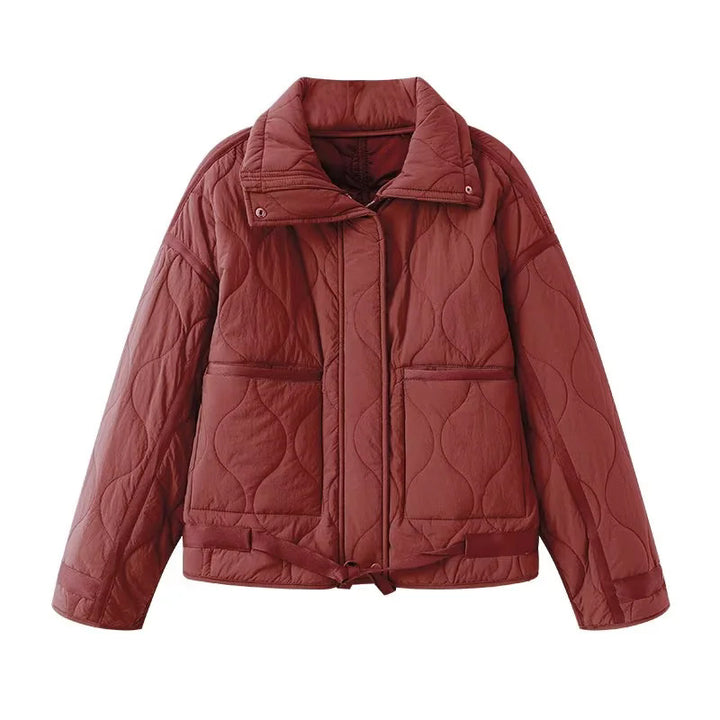 Women's quilted boxy transitional jacket with drawstring hem, stand-up collar, and patch pockets Mune Fashion