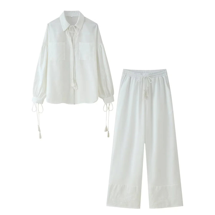 Ladies nan lightweight culotte pants with high elastic waistband, adjustable drawstring, side pockets, and embroidered hem Mune Fashion