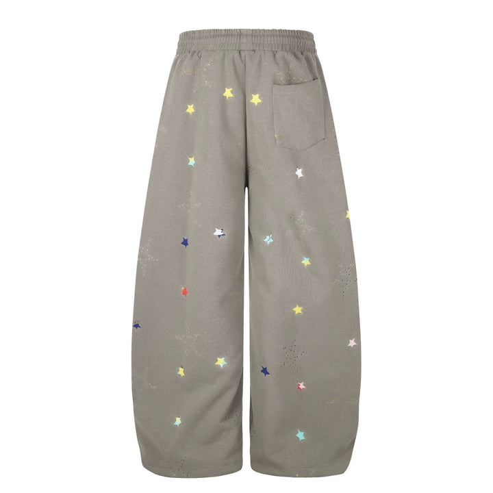 Women's extra wide palazzo capri sweatpants with star print, comfort waistband, and adjustable hem.