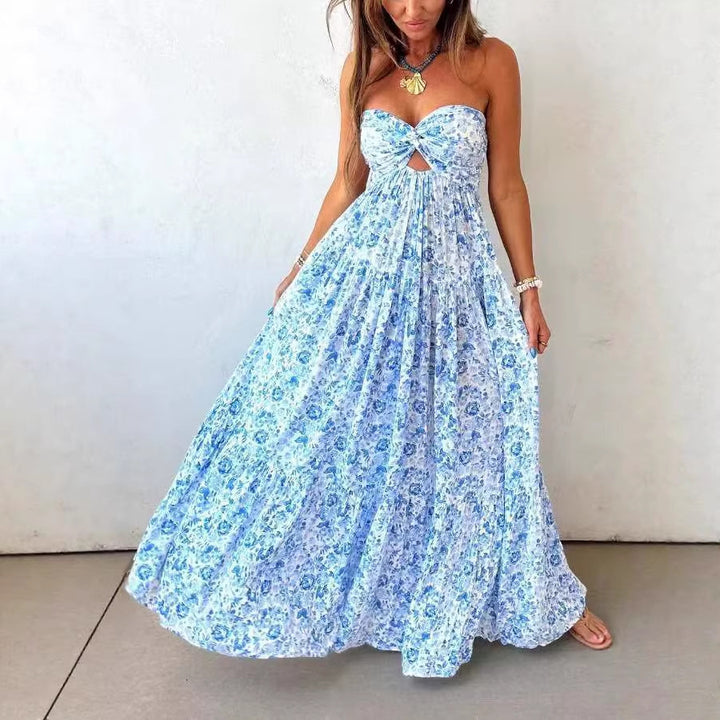 Ladies' strapless twisted bustier maxi dress with cut-out and multi-layered tiered skirt in lightweight crinkle quality Mune Fashion