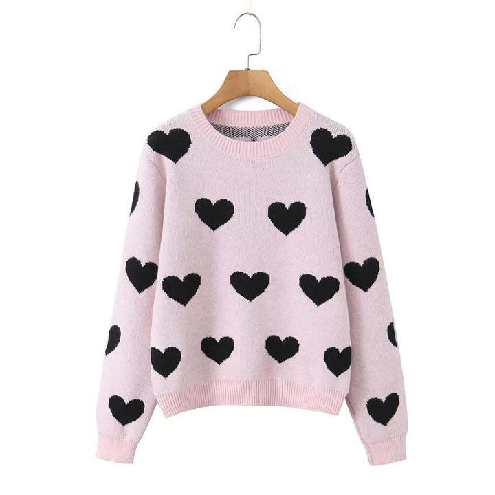 Women's heart knit sweater with round neck, oversized silhouette and ribbed cuffs Mune Fashion