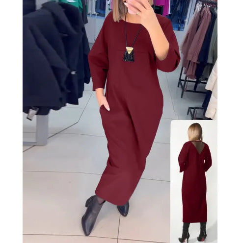 Women's straight maxi dress with ankle-length silhouette, half-length sleeves, side pockets, and transparent V-back Mune Fashion