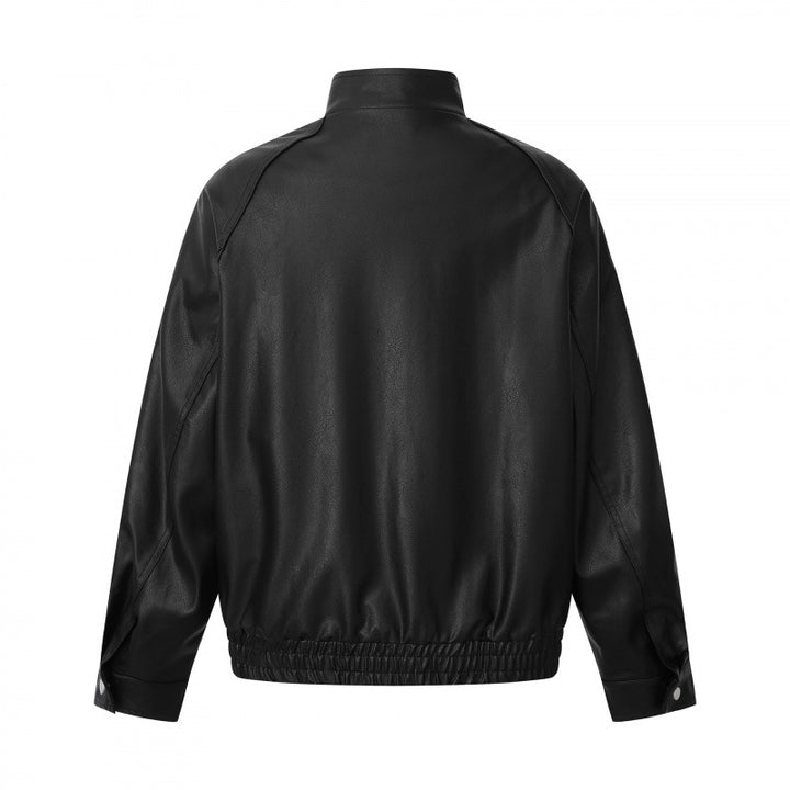 Unisex short-cut boxy faux leather bomber jacket with high stand-up collar, snap button placket, and elastic hem Mune Fashion