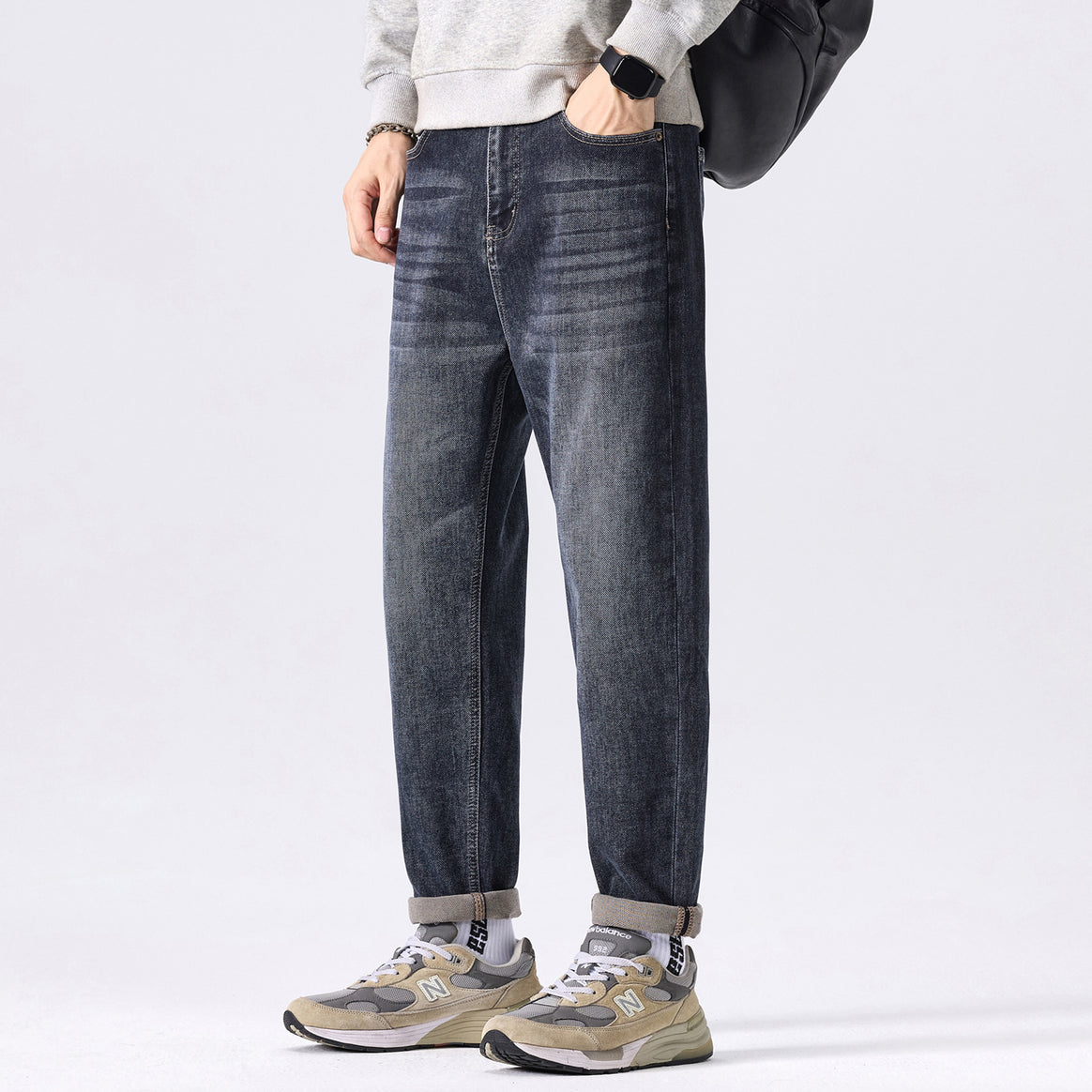 Men's tapered cut denim pants with mid-rise, relaxed fit, and subtle used look Mune Fashion