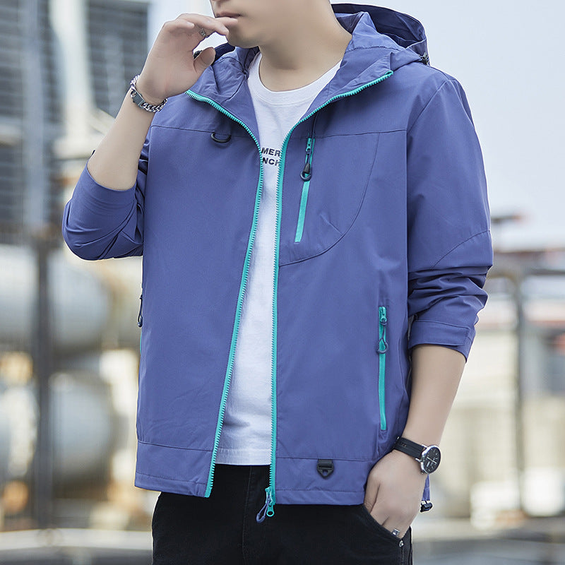 Men's lightweight Urban softshell hoodie jacket with contrasting zippers, chest pocket, and adjustable drawstring hem Mune Fashion