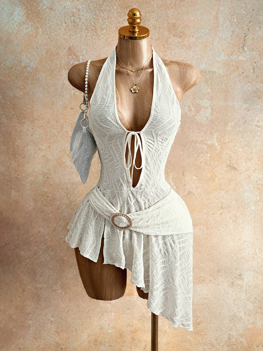 Women's figure-hugging halter mini dress with lacing, cut-out, and asymmetrical wrap skirt Mune Fashion