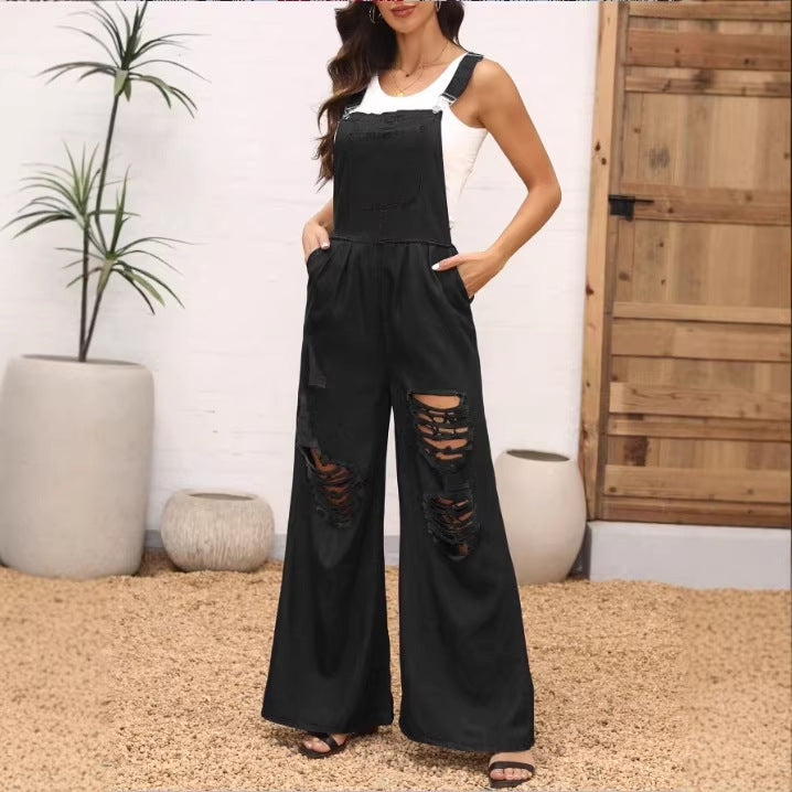 Women's loose distressed overalls with adjustable straps and large knee rips Mune Fashion
