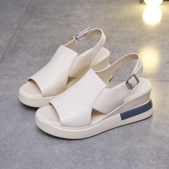Ladies' platform slide with crossed leather-look straps and ergonomic footbed Mune Fashion