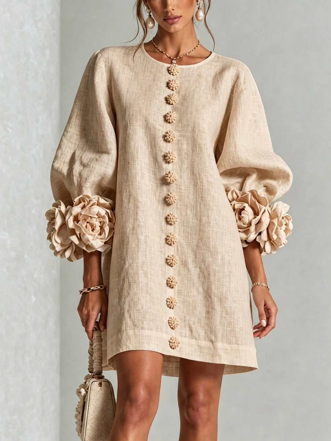 Women’s midi dress with voluminous puff sleeves, 3D flower button placket and linen texture Mune Fashion