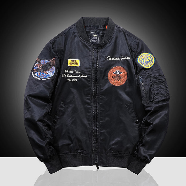 Men's bomber jacket in military patch style with sleeve utility pocket and ribbed collar Mune Fashion