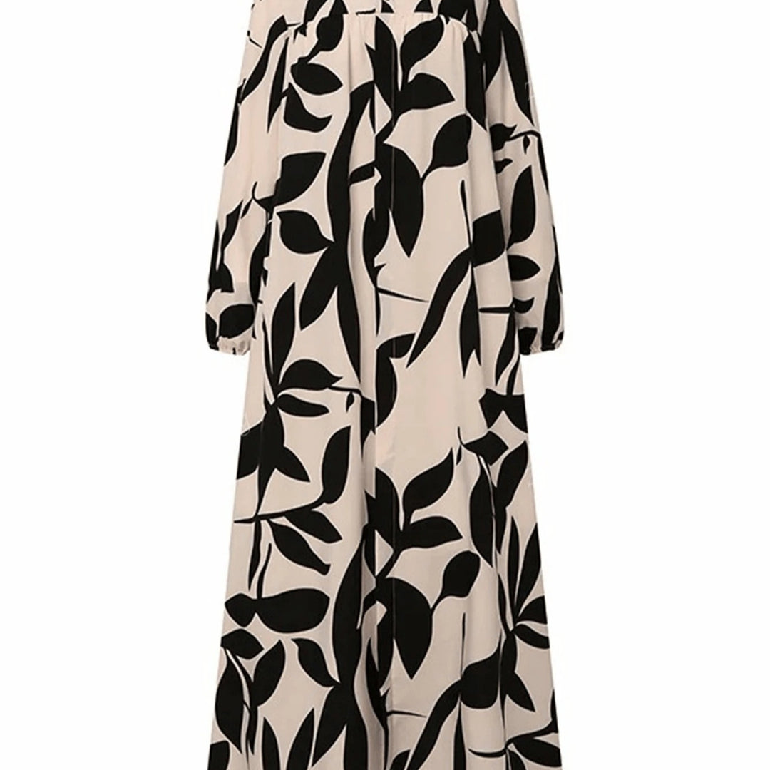 Women's maxi dress with loose A-line cut, flowing fit and eye-catching leaf print Mune Fashion