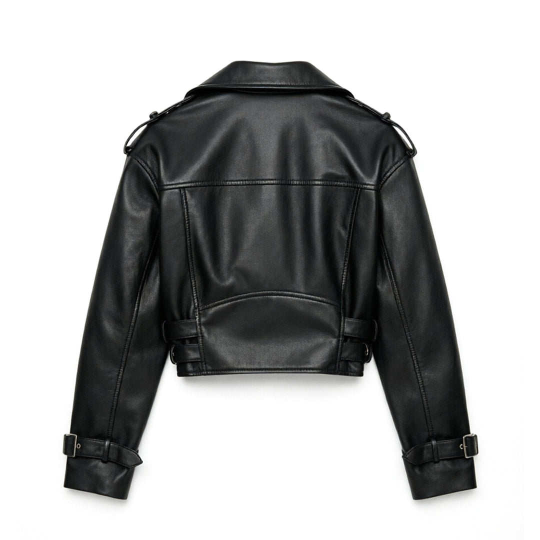 Ladies short fitted biker jacket made of faux leather with double waist belt, epaulettes and zipper details Mune Fashion