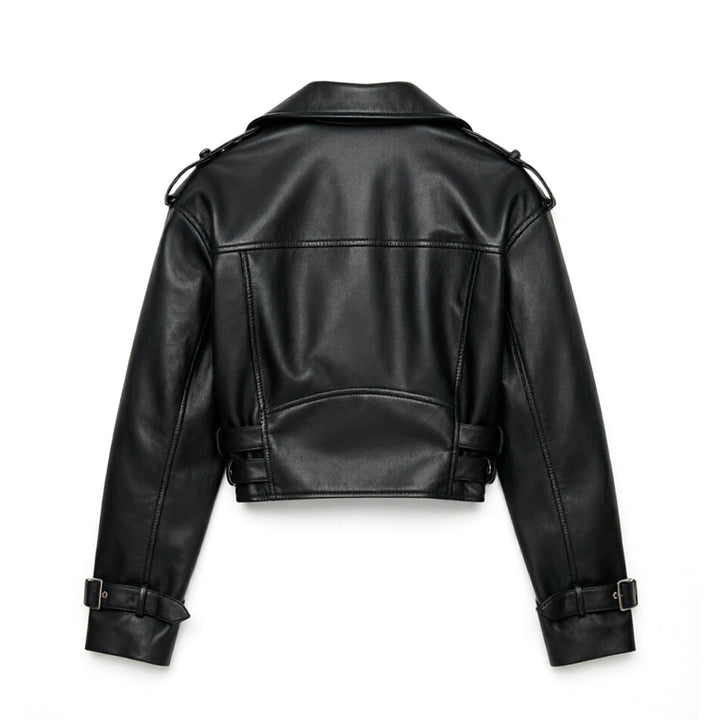 Ladies short fitted biker jacket made of faux leather with double waist belt, epaulettes and zipper details Mune Fashion