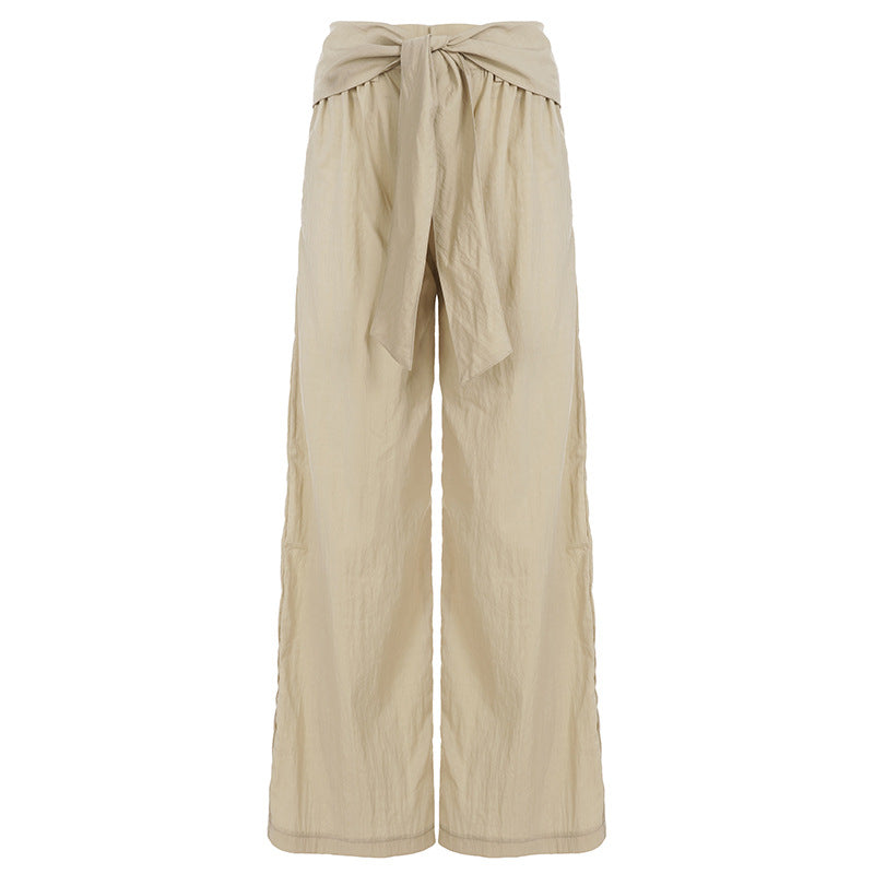 Women's high-waisted linen pants with wide leg and decorative tie belt Mune Fashion
