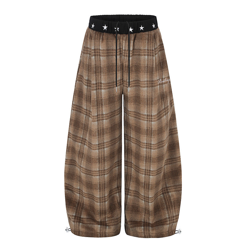 Women's Extra Wide Checked Palazzo Lounge Pants made of soft fleece with star-embellished comfort waistband, drawstring and adjustable hem.