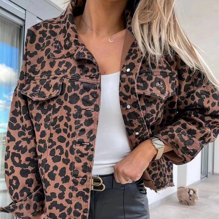 Women's cropped oversized denim jacket with leopard print, patch chest pockets, and raw hem Mune Fashion