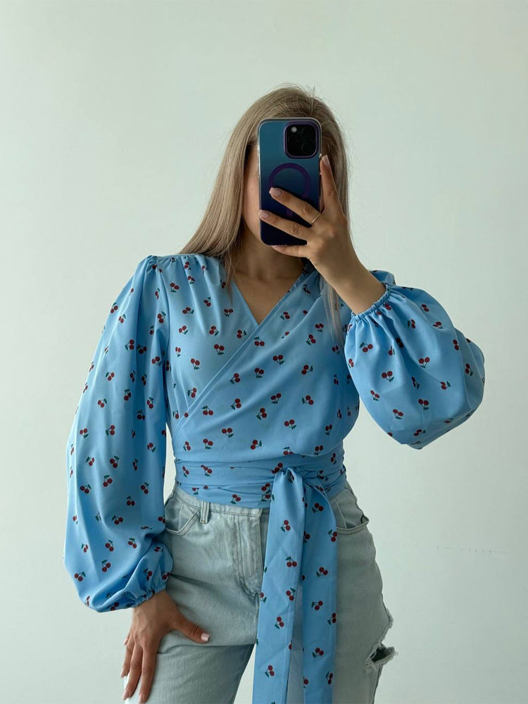 Women's wrap blouse with cherry print, wide puff sleeves & tie belt Mune Fashion