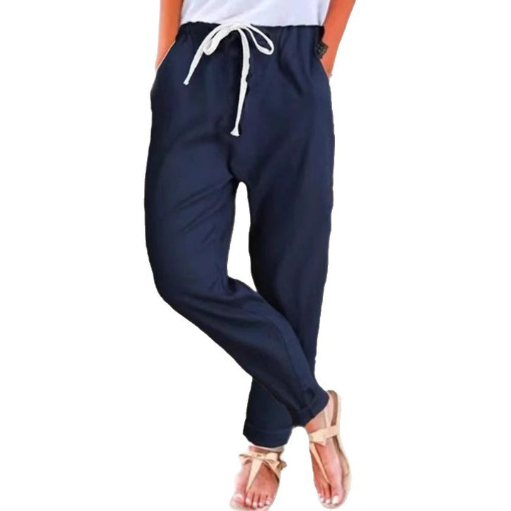 Women's light linen blend pants with elastic waistband, drawstring, and tapered ankle section Mune Fashion