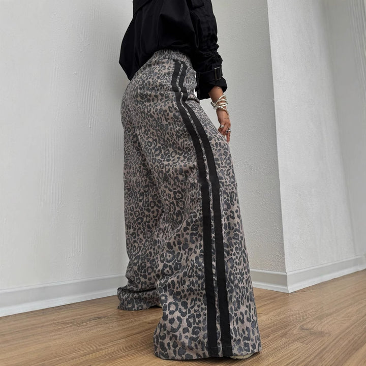 Ladies wide leopard track pants with elastic waistband and side contrast stripes Mune Fashion