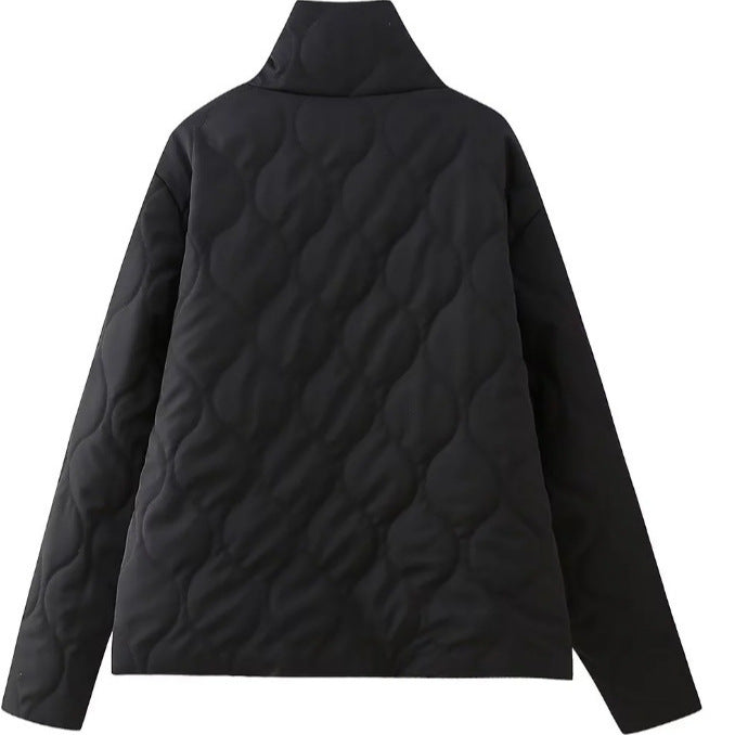 Women’s quilted jacket with stand-up collar and contrasting ruffled pockets Mune Fashion