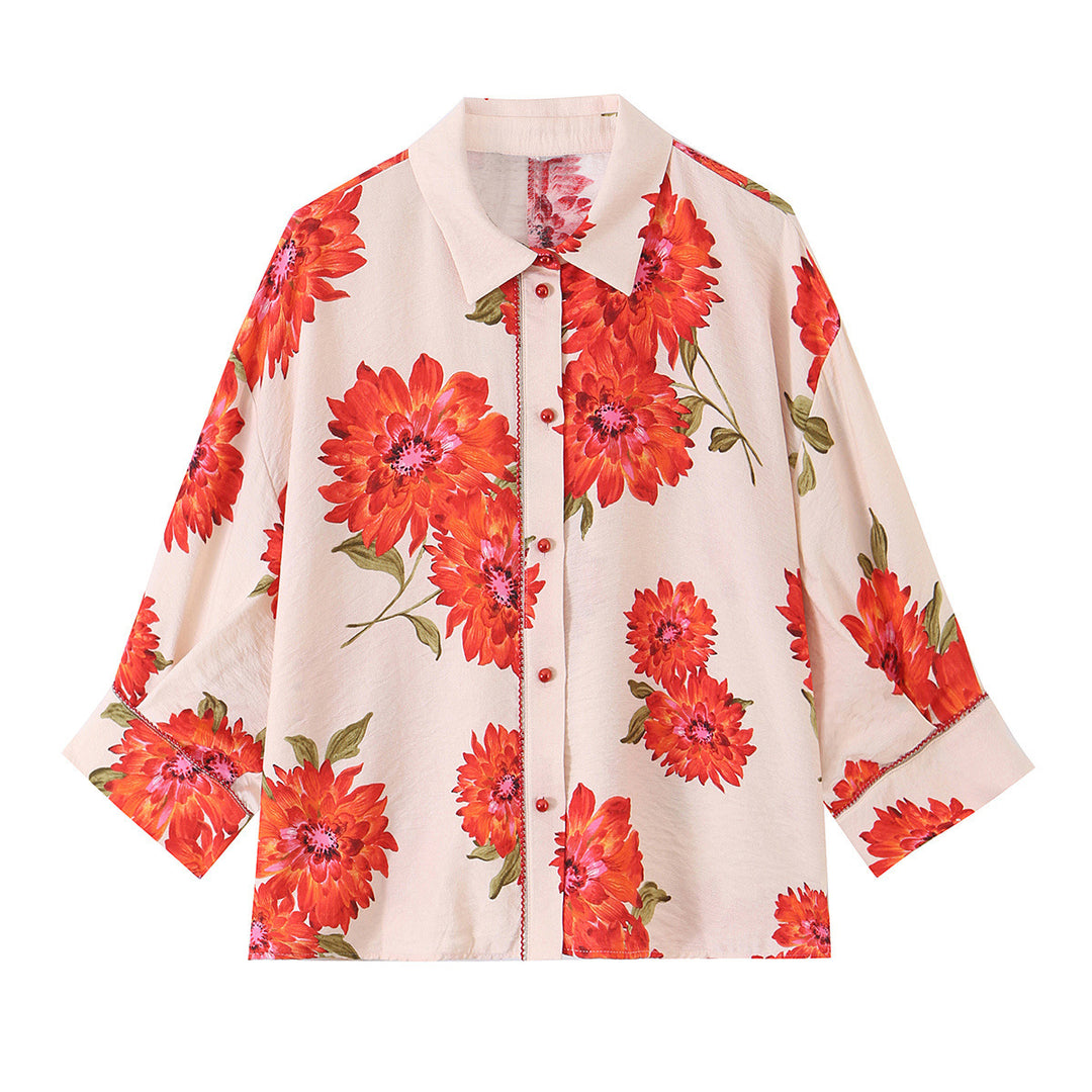 Women's oversized blouse with floral print, full button placket and three-quarter sleeves Mune Fashion