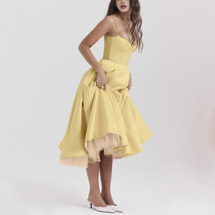 Ladies nan bustier dress with shaped bodice, soft flared skirt, integrated tulle underlay and side pockets Mune Fashion