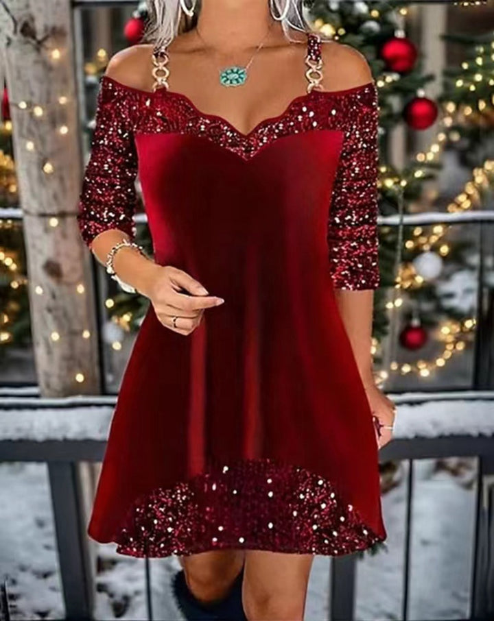 Women's off-shoulder sequin swing dress with delicate chain straps, elbow-length sleeves, and ruffle trim Mune Fashion