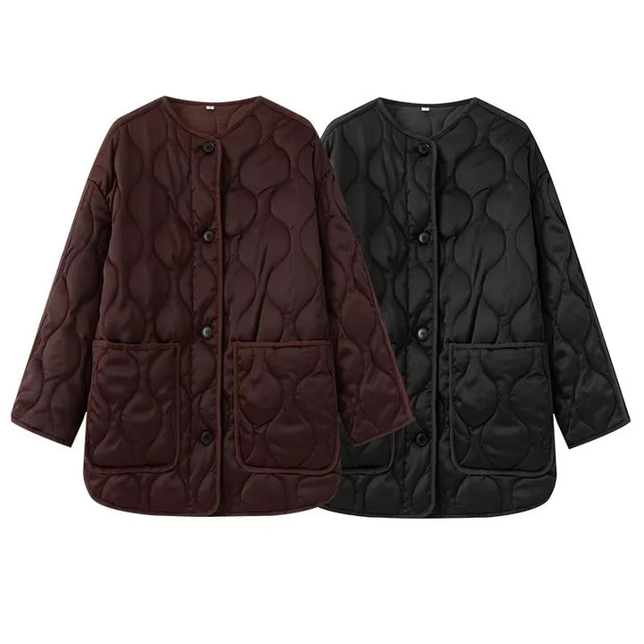 Women's quilted transitional jacket in boxy cut with round neckline, organic wave quilting, and patch pockets Mune Fashion