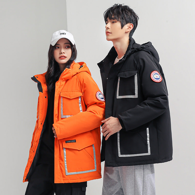 Women's parka jacket with hood, padded, reflective details and large cargo pockets Mune Fashion