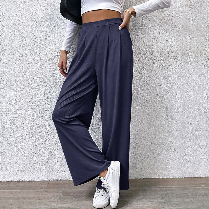 Ladies high-waisted wide trousers with front pleats, elastic waistband and side pockets Mune Fashion