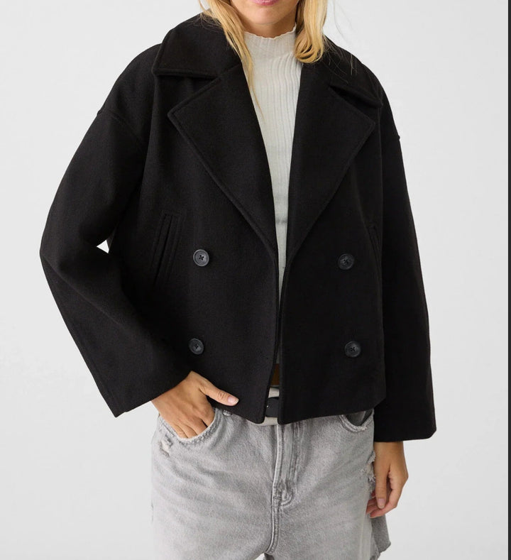 Women’s short cut double-breasted wool blend peacoat with wide lapels and boxy silhouette Mune Fashion