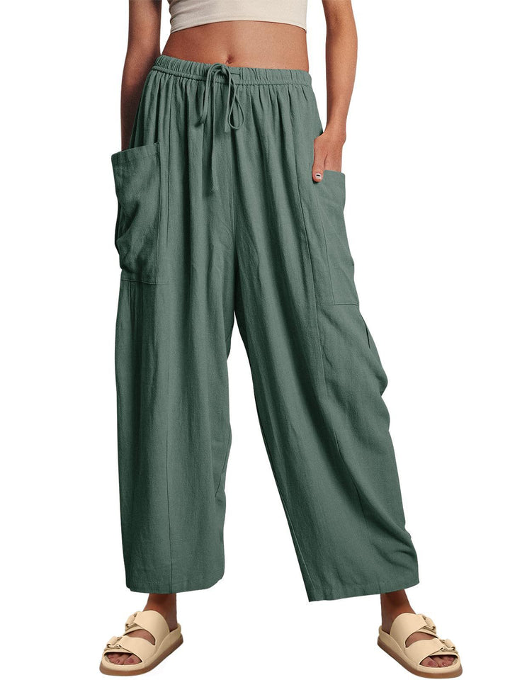 Women's wide palazzo pants made from a lightweight linen blend with drawstring and side pocket Mune Fashion