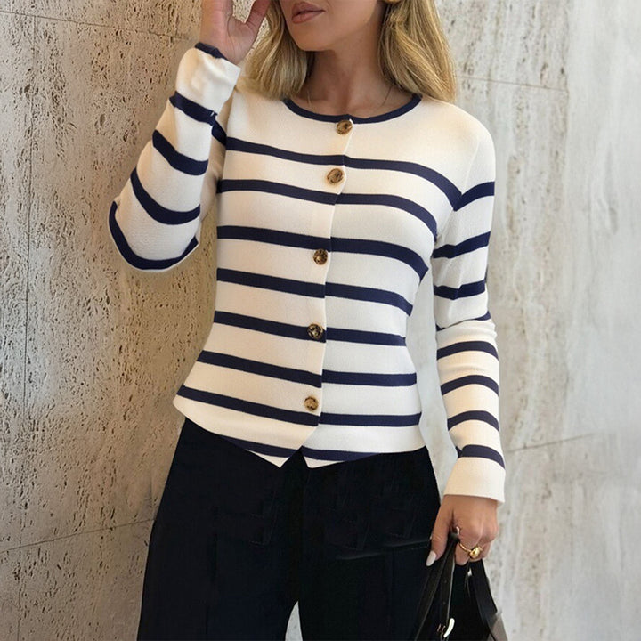 Women's striped fine knit cardigan with round neck, fitted silhouette, and decorative buttons Mune Fashion