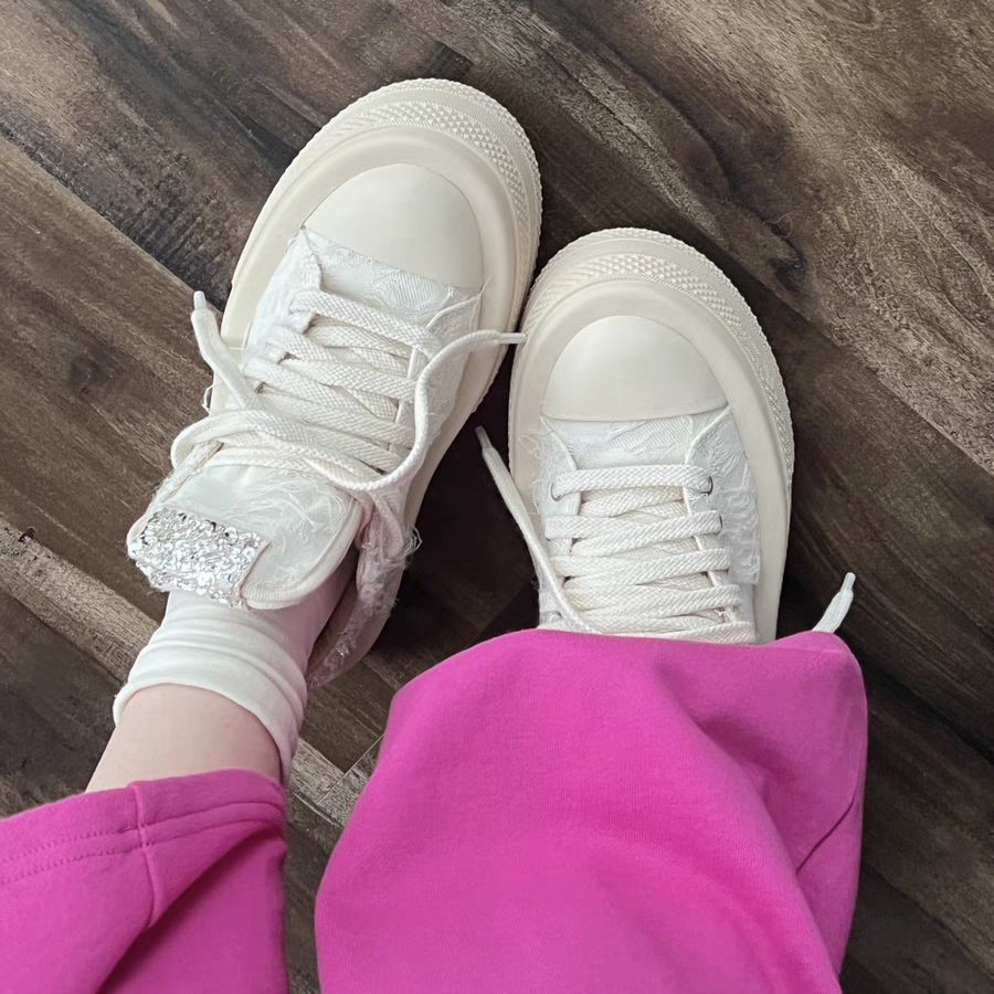 Women's sneakers with glittering appliqués and raised platform Mune Fashion